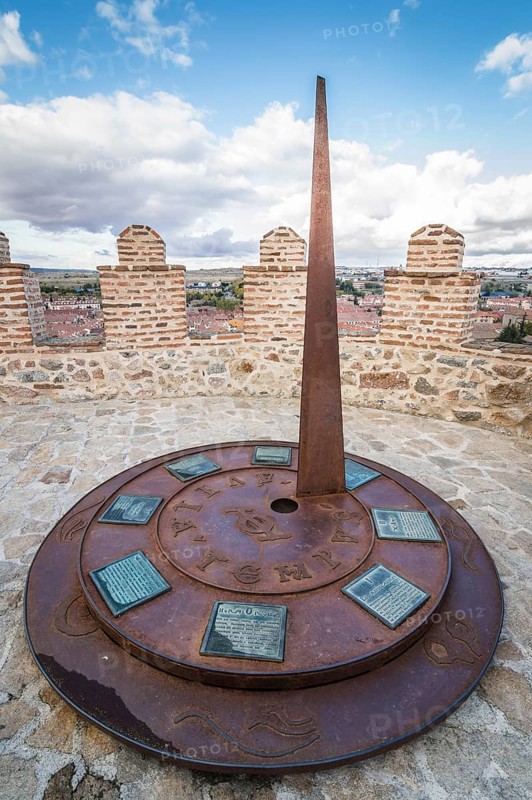 Avila, Spain, November 11, 2014: Metal Sundial in The Medieval Walls of Avila. The old city and its extramural churches were declared a World Heritage site by UNESCO, Europe