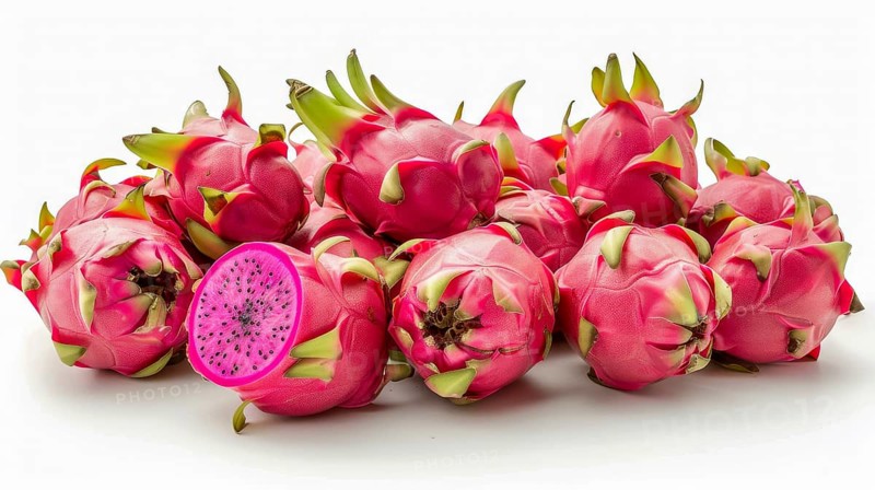 Vivid pink dragon fruits with a cross-section slice showing bright pink flesh and seeds, AI generated