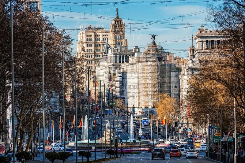 Madrid, Spain, January 28, 2024: Perspective of Alcala street, Cibeles Square and Gran via from Plaza de la Independencia. Teleles photo. Iconic cityscape of Madrid, Europe