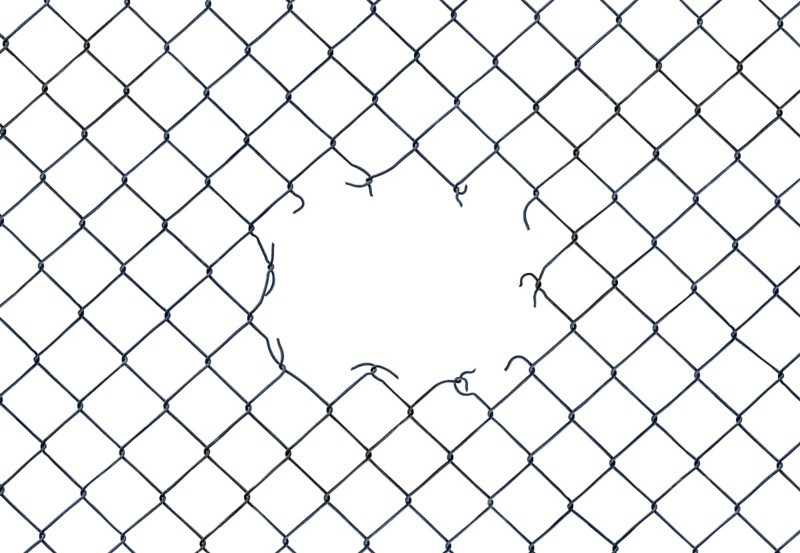 Framing Image Of A Hole In A Chain-Link Fence On A White Background