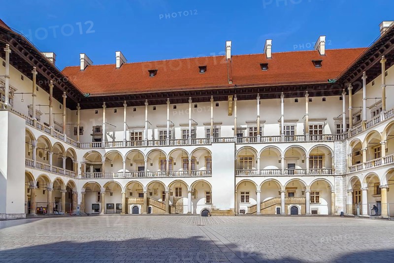 The tiered arcades of Sigismund I the Old in the Italian Renaissance courtyard within Wawel Castle, Krakow, Poland, Europe