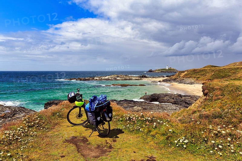 E-bike on the South West Coast Path, coastline with Godrevy Island and lighthouse, landscape conservation area, National Trust, Gwithian, St Ives Bay, Cornwall, England, United Kingdom, Europe