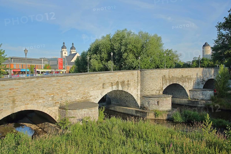 Historic Old Elster Bridge with church towers of the over the White Elster, river, stone arch bridge, Plauen, Vogtland, Saxony, Germany, Europe