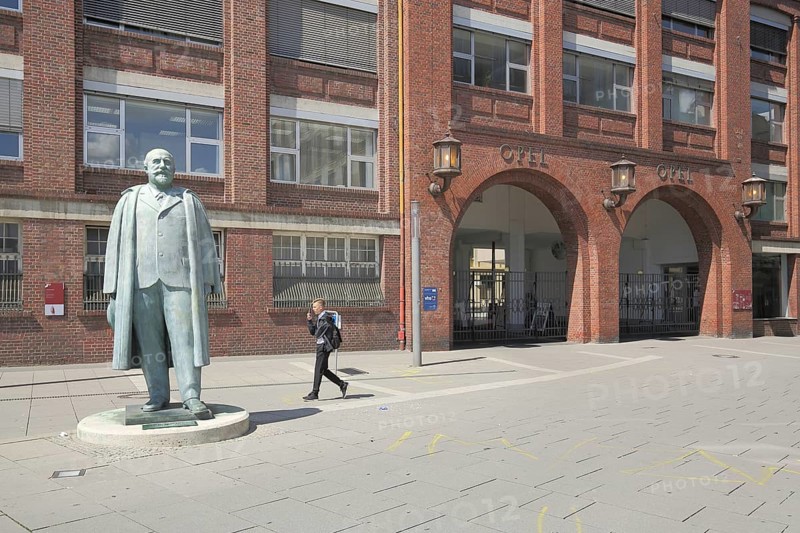 Monument and statue to Adam Opel 1837-1895 in front of the main portal, Adam Open AG, Rüsselsheim, Hesse, Germany, Europe