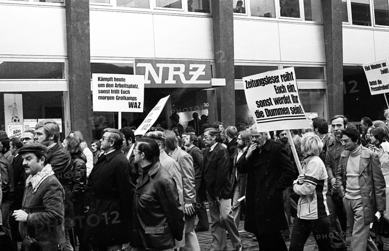 Several hundred journalists and employees of the publishing houses of the newspapers WAZ (Westdeutsche Allgemeine Zeitung) and NRZ (Neue Ruhr-Zeitung) took to the streets in Essen on 27 October 1975 in protest against the merger out of concern for their jobs and press freedom, Germany, Europe