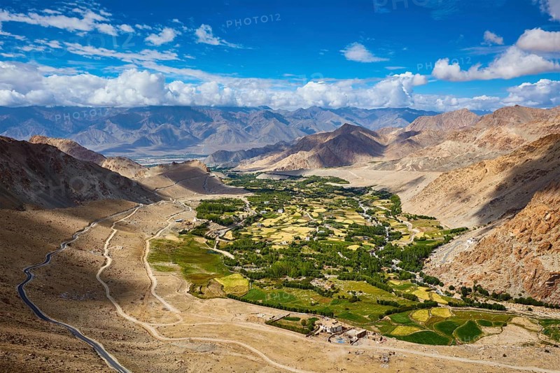 View of green Indus valley from ascend to Kardung La pass, - allegedly the highest motorable pass in the world (5602 m) . Ladakh, India, Asia
