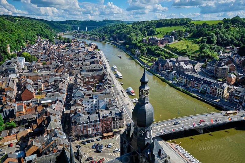 Aerial view of Dinant town, Collegiate Church of Notre Dame de Dinant, River Meuse and Pont Charles de Gaulle bridge from Dinant Citadel. Dinant, Belgium, Europe