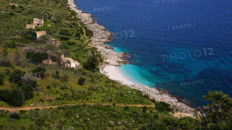 Coastline, turquoise bay, small pebble beach, houses, Zingaro, national park, nature reserve, northwest, Sicily, Italy, Europe
