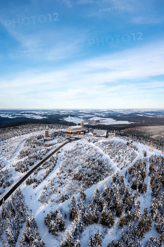 Fichtelberg highest mountain in the Ore Mountains in winter aerial view in Oberwiesenthal, Germany, Europe