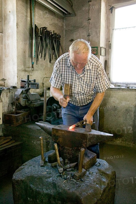 Blacksmith at the Demitz-Thumitz granite works. The granite processing tools have to be reforged, sharpened and hardened every day