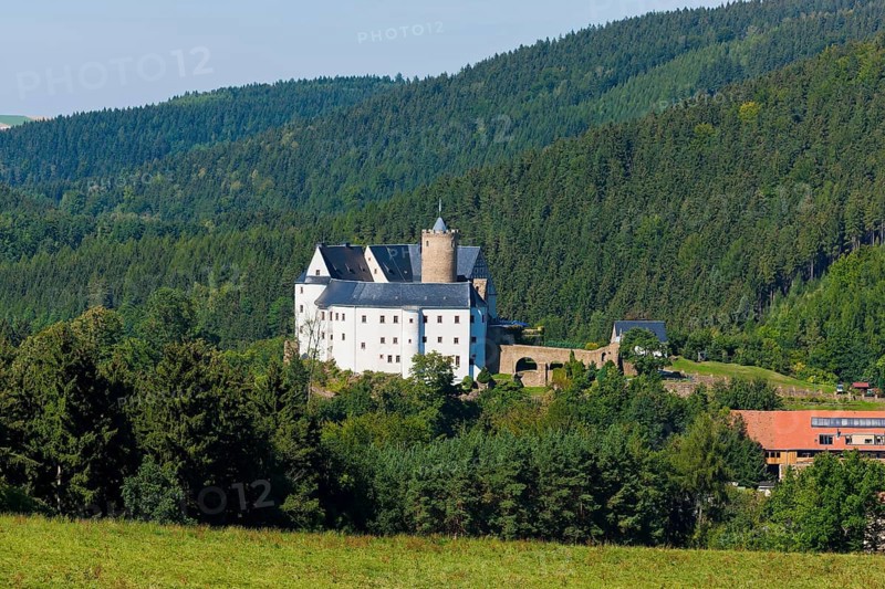 Scharfenstein Castle Scharfenstein Castle is located on an elongated mountain spur above the village of Scharfenstein, a district of Drebach in the Ore Mountains in the Free State of Saxony. The original building was erected around 1250. It is thought to have been built by the von Waldenburg family, but only the first ownership is certain. In 1993, the castle was taken over by the Free State of Saxony - Saxon Palace Administration. The castle was subsequently renovated in line with its listed status