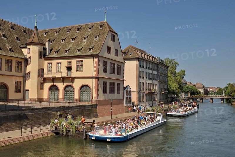 Excursion boat with tourists in front of the old slaughterhouse, Ancienne Boucherie, on the River Ill, "La Petite France", UNESCO World Heritage Site, Petite-France, Strasbourg, Département Bas-Rhin, Alsace, France, Europe