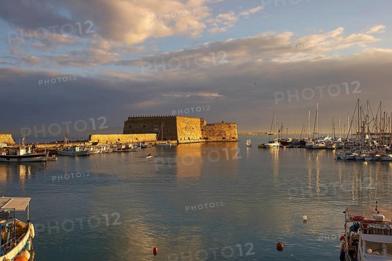 Morning light, Venetian sea fortress, Koules, Morosini, harbour wall, fishing boats, blue sky, white-grey clouds, harbour, Heraklion, capital, island of Crete, Greece, Europe