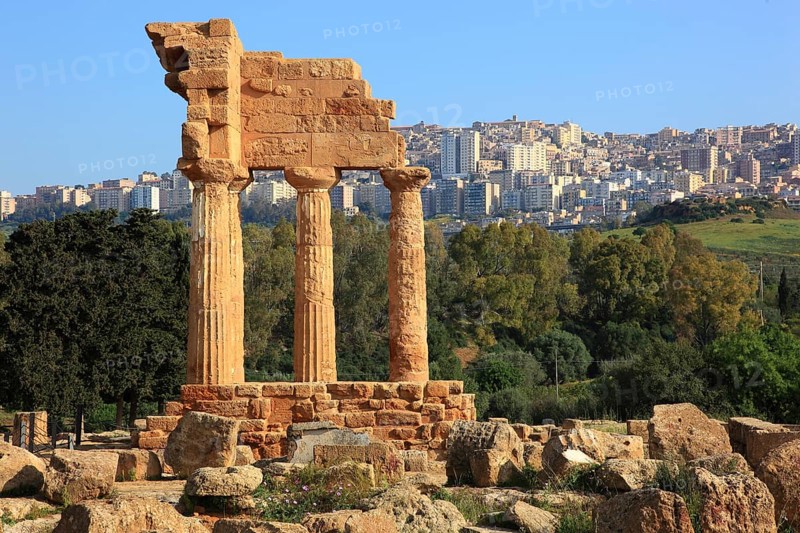 In the Parco Valle dei Templi di Agrigento, Unesco World Heritage Site, remains of the ancient city of Akragas in the Valley of the Temples of Agrigento, remains of the Temple of Dioscuri at Porta V, Sicily, Italy, Europe