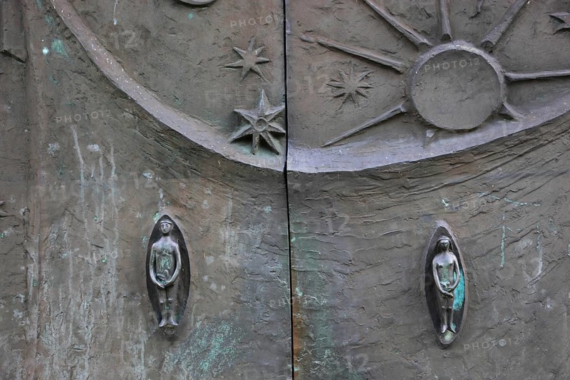 Entrance door with Adam and Eve, St. Boniface, a former free-world ladies' convent with a collegiate church in Freckenhorst, Warendorf district, North Rhine-Westphalia, Germany, Europe
