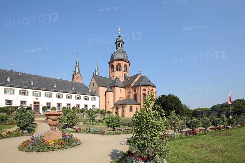 Garden with Einhard Basilica of St. Marcellinus and Peter, monastery complex, Seligenstadt, Main, Hesse, Germany, Europe