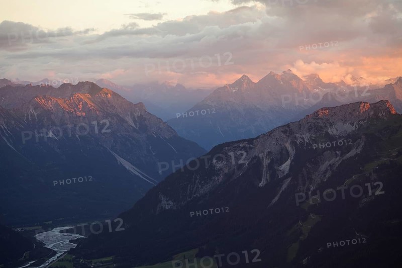 The Lech Valley near Reutte, Austria. Sunset over the Alps