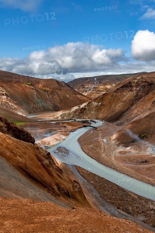 Stream between colourful rhyolite mountains, Hveradalir geothermal area, Kerlingarfjöll, Icelandic highlands, Iceland, Europe