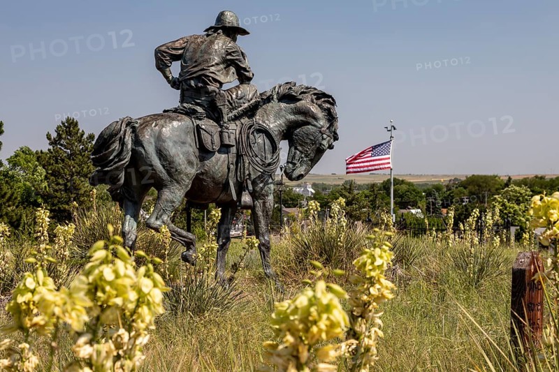 Ogallala, Nebraska, Boot Hill, a cemetery for gun fighters, murder victims, and others that was used until 1885. Some of those buried here were cowboys who drove cattle from Texas to the Union Pacific railhead in Ogallala. The statue at the top of the hill, The Trail Boss by Robert Summers, represents the Texas cattle drovers