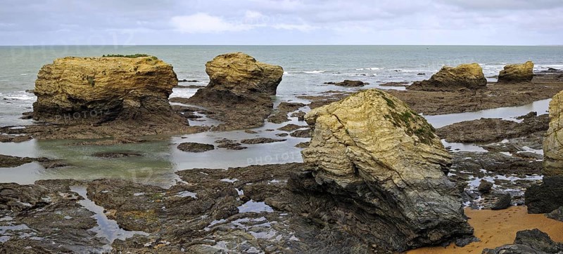 Sea stacks at the Plage des Cinq Pineaux at Saint-Hilaire-de-Riez, La Vendée, Pays de la Loire, France, Europe