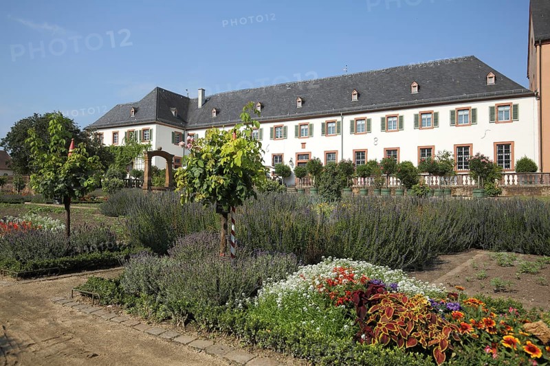 Convent building with garden from the monastery complex, Seligenstadt, Main, Hesse, Germany, Europe