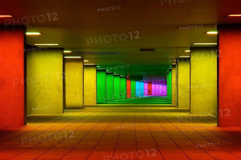 ROTTERDAM, NETHERLANDS, MAY 11, 2017: Colorful mulitcolored illuminated gallery tunnel rainbow passage installation under NAI building, Nederlands Architecture Institute near MuseumPark, Rotterdam