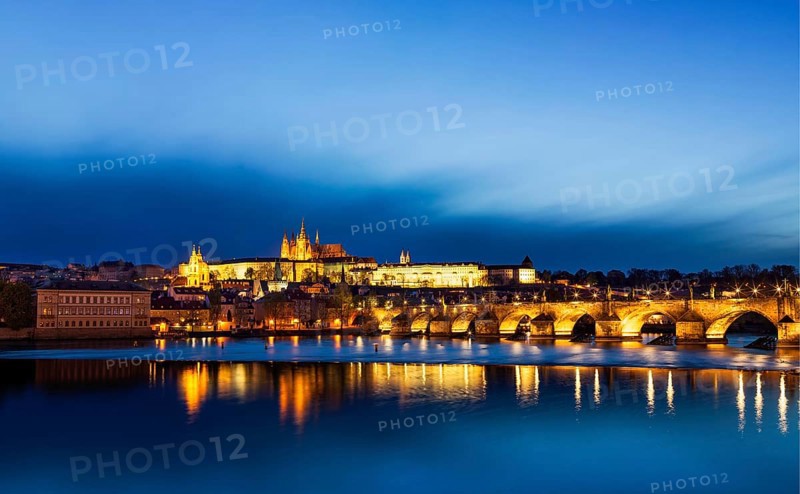 Panorama of Charles Bridge (Karluv most) and Prague Castle in twilight. Prague, Czech Republic, Europe