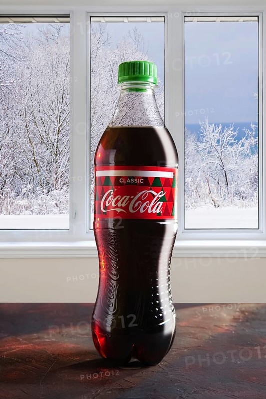 December 7, 2018, Minsk, Belarus, bottle of Coca-Cola on the table with winter view in the window on background, Europe
