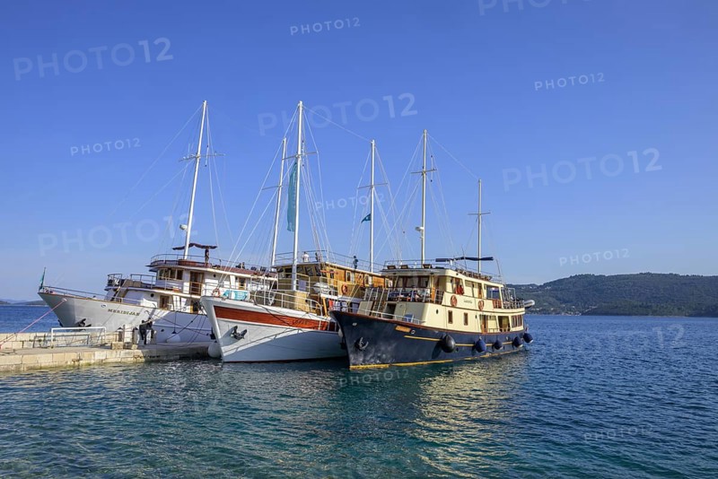 Three ships on the pier, Kucište, Orebic, Pelješac Peninsula, Dubrovnik-Neretva County, Croatia, Europe
