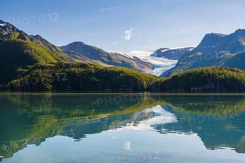 Glacier tongue of the Svartisen glacier reflected in glacial lake, Helgeland coast, Nordland, Norway, Europe