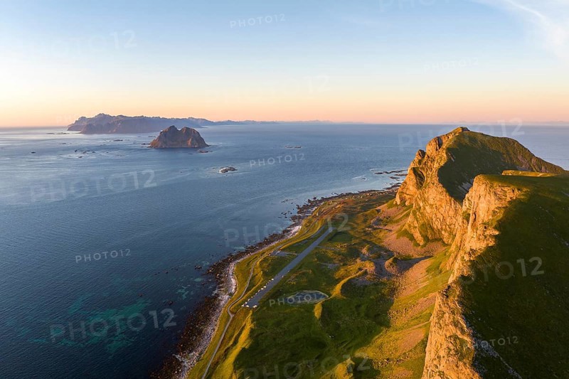 Coast and mountains in the evening light, runway of the abandoned airport, Værøy island, Vaeroy, Lofoten, Norway, Europe