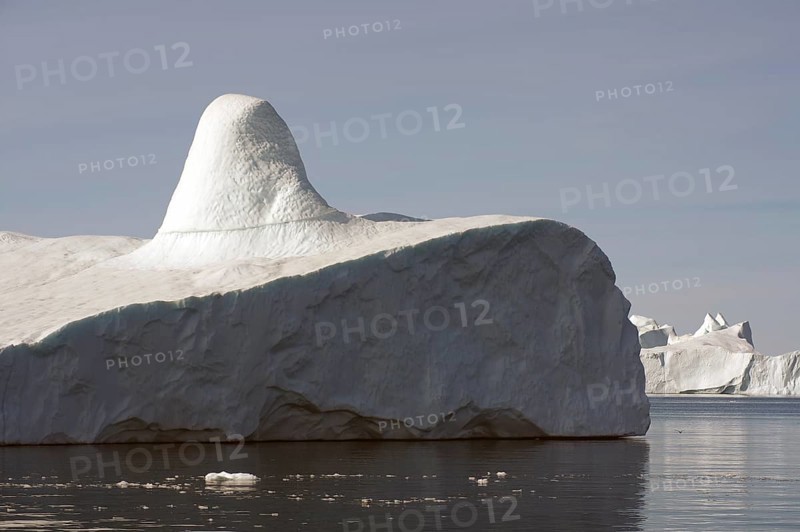 Giant iceberg with knob in the light of the midnight sun Disko Bay, Ilulissat, Arctic, Greenland, Denmark, North America