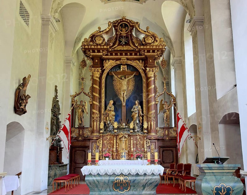 High altar from 1692 in the choir of the monastery church of Kreuzberg, a monastery of the Franciscan Observants near the city of Bischofsheim an der Rhön, Rhön-Grabfeld district, Lower Franconia, Bavaria, Germany. The church of the monastery of Kreuzberg near the city of Bischofsheim, Rhön Mountains, Lower Frankonia, Bavaria, Germany, Europe