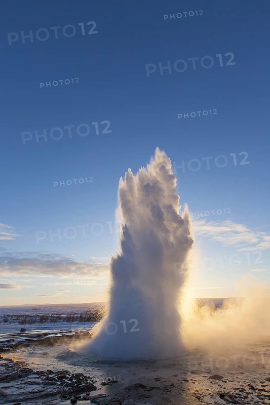 Eruption of Strokkur, fountain geyser in the geothermal area beside the Hvítá River in winter, Haukadalur, Sudurland, Iceland, Europe