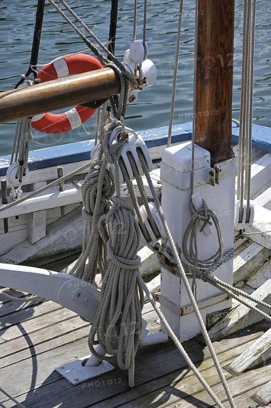 Ropes in wooden blocks, pulleys on board of a sailing ship, Brittany, France, Europe