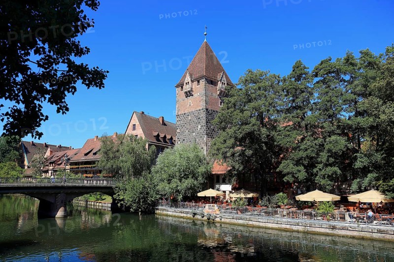 In the historic centre of Nuremberg, houses and restaurant with beer garden on the island of Schütt, Pegnitzinseln, Middle Franconia, Bavaria, Germany, Europe