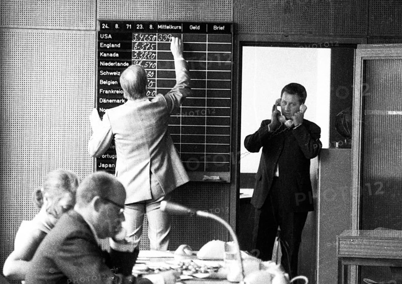 Trading in international currencies is the business of the foreign exchange market, here on 24.8.1971 in Düsseldorf, Germany, Europe