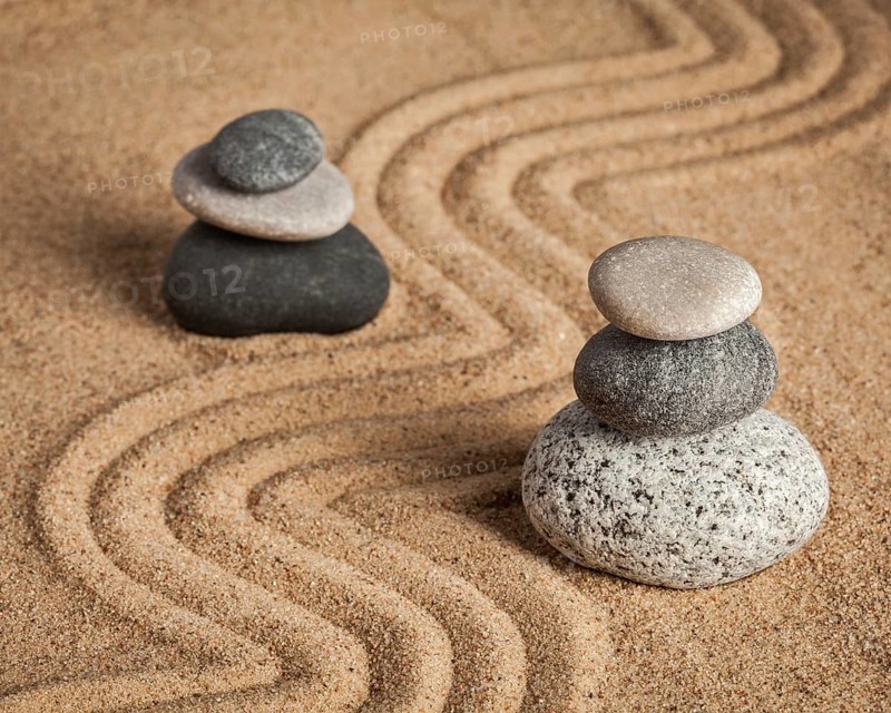 Japanese Zen stone garden, relaxation, meditation, simplicity and balance concept, pebbles and raked sand tranquil calm scene