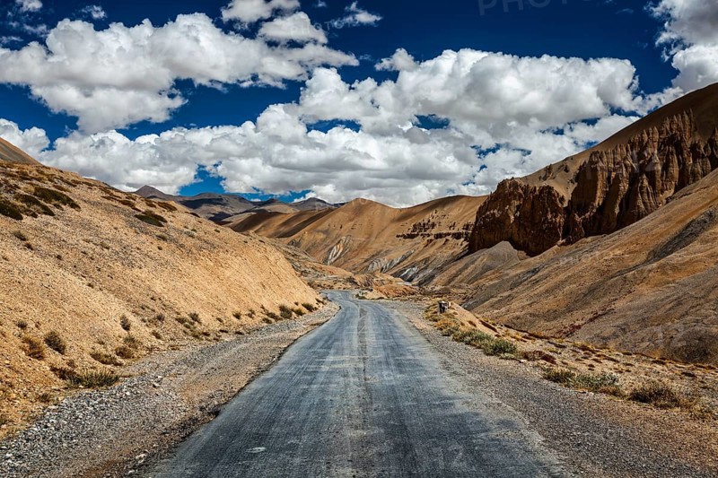 Travel forward adventure background, Trans-Himalayan Manali-Leh highway road in Himalayas. Ladakh, Jammu and Kashmir, India, Asia