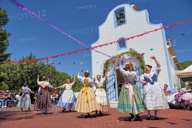 Women in traditional dress dance in front of the Ermita de San Vicent chapel, annual fiesta in honour of the saint of the same name in Cautivador or Captivador, La Nucía municipality, Alicante province, Valencia region, Costa Blanca, Spain, Europe