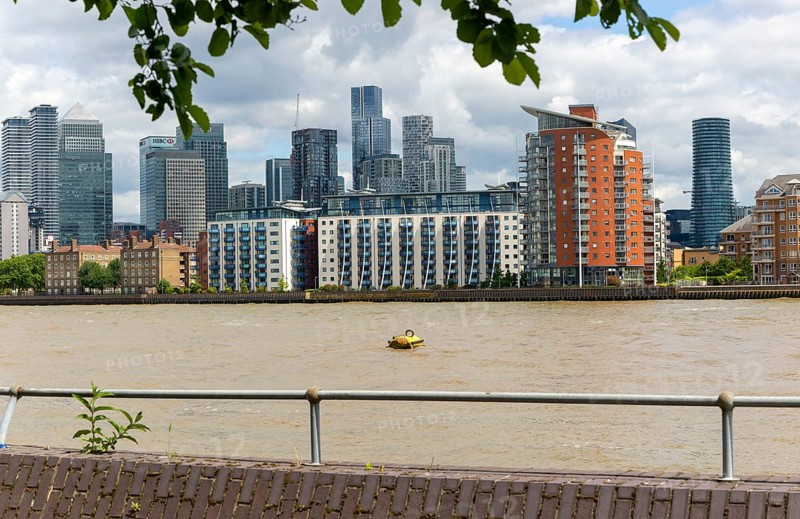 View from Deptford of River Thames and high rise offices of Canary Wharf, London, England, UK