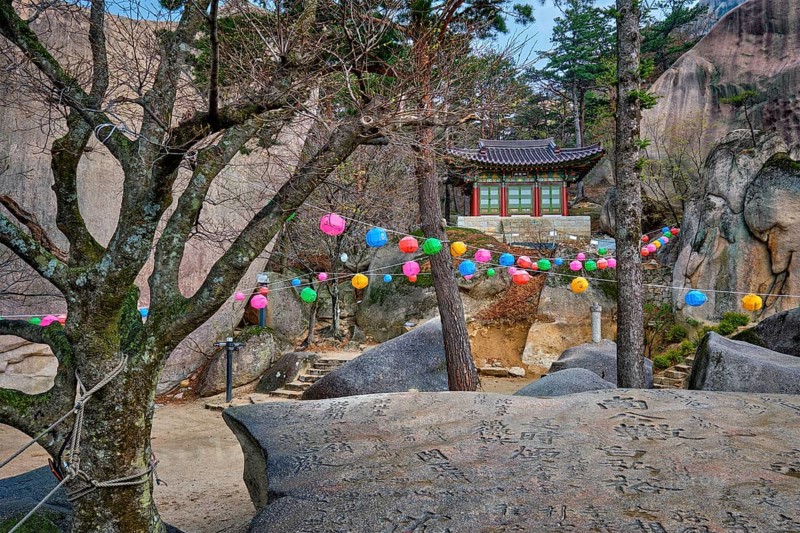 SEORAKSAN, SOUTH KOREA, APRIL 14, 2017: Kyejoam Seokgul Hermitage shrine and Ulsanbawi rock in Seoroksan National park, South Korea, Asia