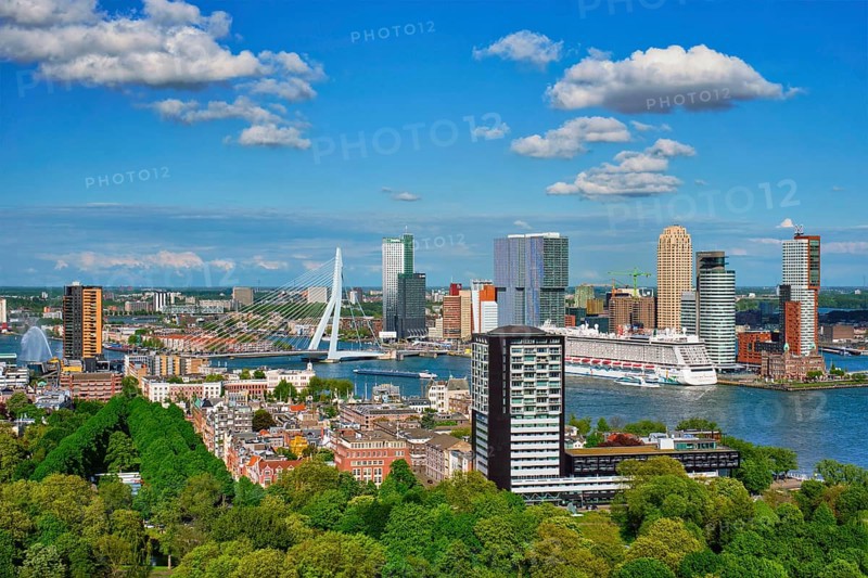 ROTTERDAM, NETHERLANDS, MAY 14, 2017: View of Rotterdam city and the Erasmus bridge Erasmusbrug over Nieuwe Maas river with cruise liner from Euromast