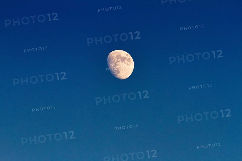 Waxing moon, blue sky, France, Europe