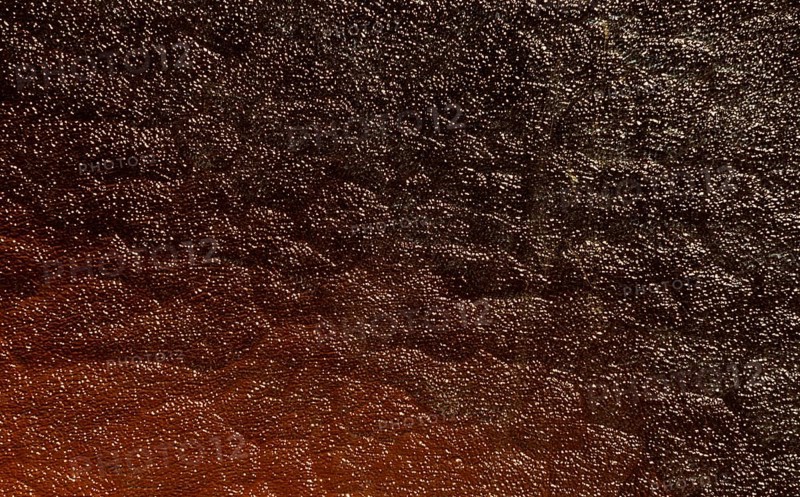 Light reflections on a pane of glass, abstract black and white orange background