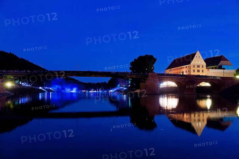 (Copyright © Sylvio Dittrich +49 1772156417) Grimma, inauguration of the Pöppelmannbrücke bridge after its destruction by the floods of the Mulde in 2002: the people of Grimma commemorated and celebrated the flooding of the town and the reconstruction of the town and the Pöppelmannbrücke bridge with a staged landscape symphony featuring a light art performance and orchestral music