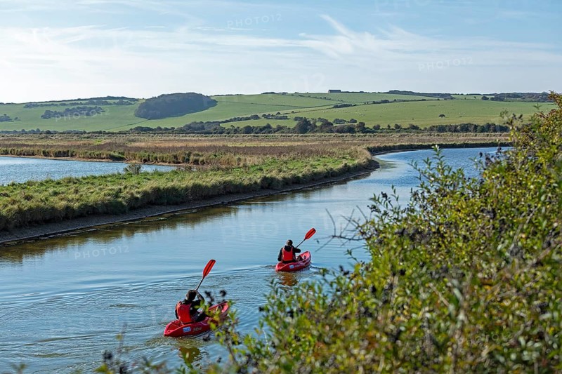 Kayaks on the River Cuckmere, Cuckmere Haven, Seven Sisters, East Sussex, England, Great Britain