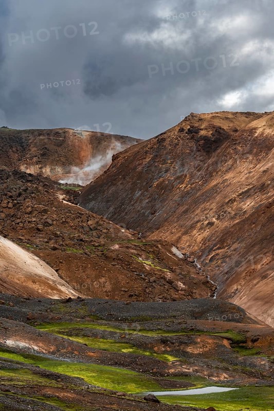 Hot springs between colourful rhyolite mountains, Hveradalir geothermal area, Kerlingarfjöll, Icelandic highlands, Iceland, Europe
