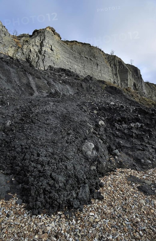 Black Ven landslide on beach between Lyme Regis and Charmouth along the Jurassic Coast, Dorset, southern England, UK