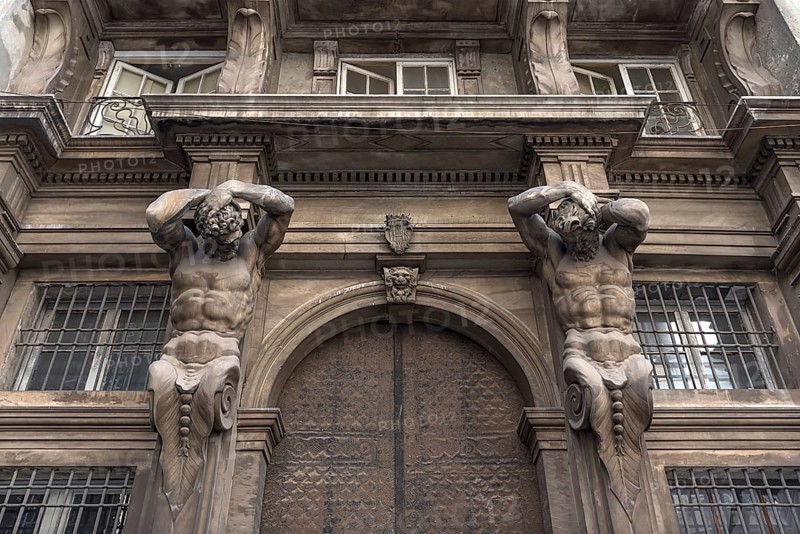 Atlases at the entrance portal Palazzo Gio Carlo Brignole, built in 1671, today used as an office and residential building, Piazza della Meridiana, 2, Genoa, Italy, Europe